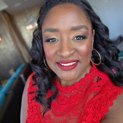 Carmella J Bell