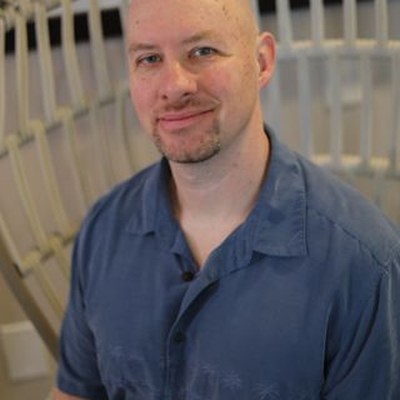 Mark B Luzader